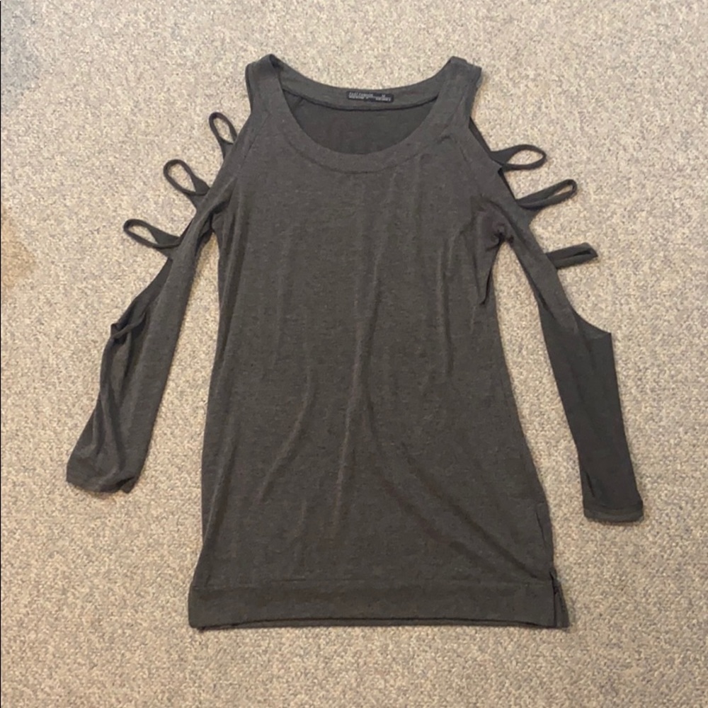 long shirt with cut outs on the arms